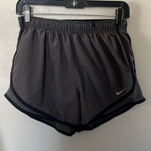 dark grey Nike running shorts